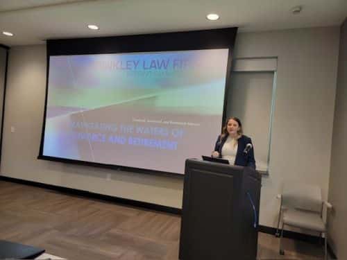 Kaitlin Burke speaking at conference